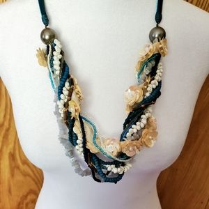 Unique shell and bead necklace.